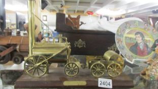 A brass model of Stephenson's Rocket.