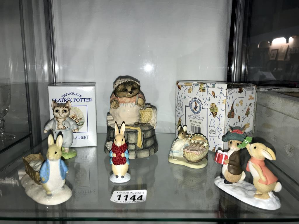 A mixed lot of Peter Rabbit items including musical Mrs Tiggy Winkle,