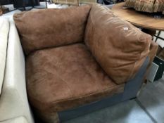 A corner leather chair/sofa