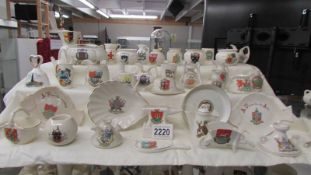 Forty pieces of assorted crested china.