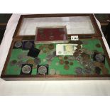 A jewellers display cabinet of coins including crowns etc