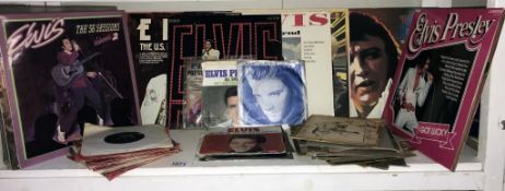 A good selection of vintage Elvis vinyl LP's and 45's singles