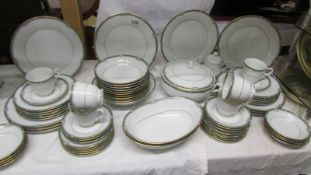 A Noritake dinner service stamped design 'Glen Abbey' pattern, 65 pieces in total.