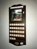 A Halcyon studio wooden wall calendar with a card of a pre-war MG sports car (this section may have