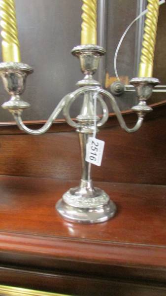A three branch silver plate candelabra. - Image 2 of 2