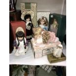 A selection of boxed collectors dolls