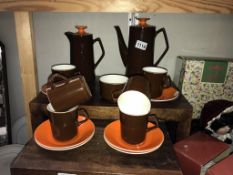 A retro Beswick orange and brown coffee set