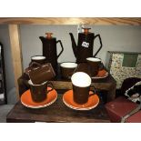 A retro Beswick orange and brown coffee set