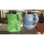 A blue Sylvac squirrel jug and a green Sylvac rabbit jug.