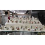 Fifty pieces of assorted crested china, various crests,