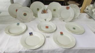 Twelve W H Goss crested tea plates.