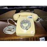 A vintage cream dial telephone