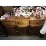 A solid pine 3 drawer 3 door kitchen cupboard dresser base