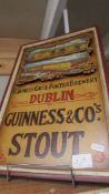 A Guinness advertising sign.