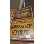 A Guinness advertising sign.