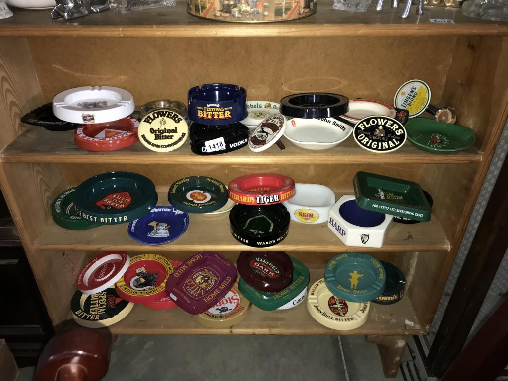 A large quantity of breweriana ashtrays