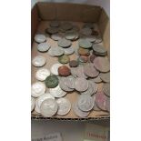 A mixed lot of coins and four foreign bank notes.