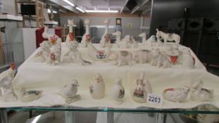 26 pieces of assorted crested china, various crests, all animal related including camels, donkey,