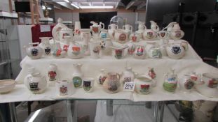 Fifty pieces of assorted crested china, various crests,