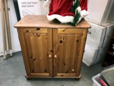 A pine computer desk/cupboard