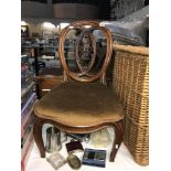 A cut down Victorian walnut chair
