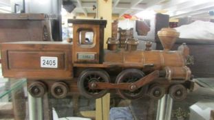 A good quality wooden model steam train.