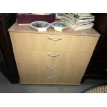 A Beech effect 4 drawer chest of drawers