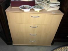 A Beech effect 4 drawer chest of drawers