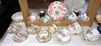 A quantity of bone china cups and saucers including Royal Albert etc
