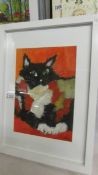 A framed and glazed acrylic of a tabby cat initialed K C. (Collect only).