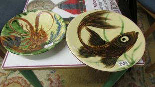 Two vintage Puidgemont studio art pottery platters, Fish 13.5" diameter, Lobster 11" diameter.