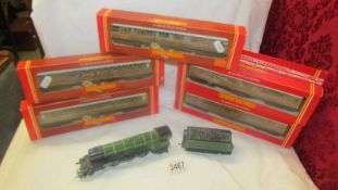 A Hornby 'OO' gauge Flying Scotsman and five carriages, R413, R477 and R478.