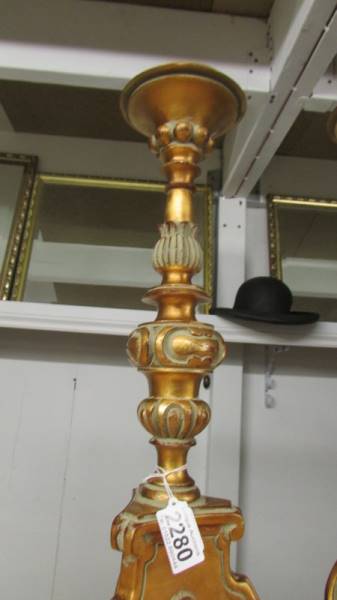 A pair of tall gilded 'pricket' candlesticks. - Image 3 of 3