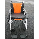 A G-Logic excel lightweight wheel chair in as now condition (over £250 new).