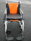 A G-Logic excel lightweight wheel chair in as now condition (over £250 new).