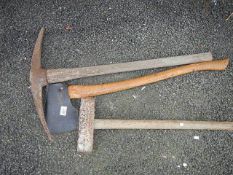 A good quality leather sheathed axe, a sledge hammer and a pick axe.