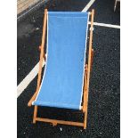 A vintage wood and canvas deck chair.
