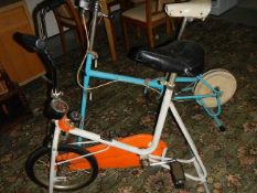 2 vintage exercise bikes.