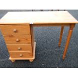 A 4 drawer pine dressing table.