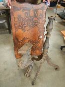 A marquetry inlaid panel (probably top from chest of drawers), a tripod base and a carved leg.