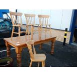 A pine dining table and 4 chairs (table 83 x 91 cm x 78 cm high).