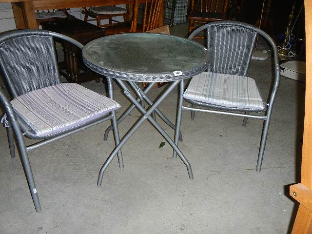 A glass top garden table and 2 chairs,. - Image 2 of 3