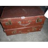 2 vintage suitcases containing vintage Christmas decorations.