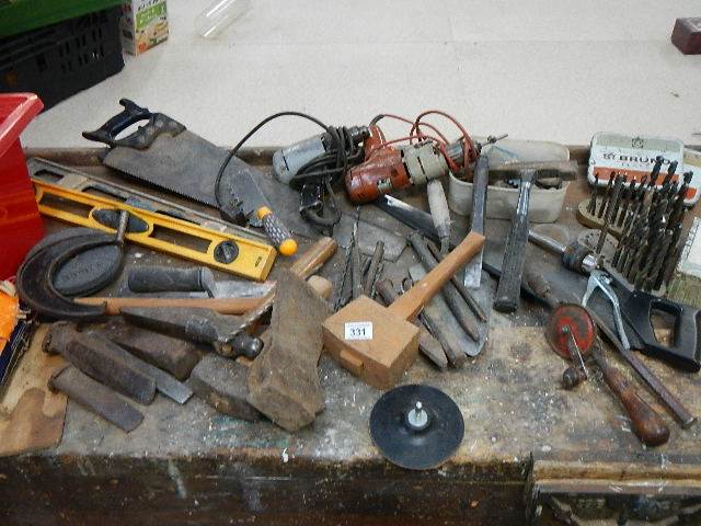 A mixed lot of tools including hammers, saws, 2 electric drills,