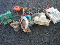 A Nikita circular saw, lead light, battery charger, foot pump, blow torch and an Elu belt sander,