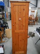 A single door pine wardrobe. ****Condition report**** In good order Height 183cm.