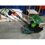 A Black & Decker lawn raker, rotovator and seed spreader.