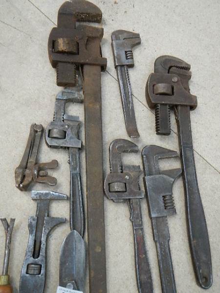 A good selection of Stilsons (some Record) and other tools.