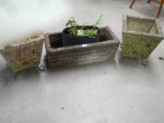 2 square concrete planters on wrought iron feet (32cm square x 34 cm high) and a concrete trough