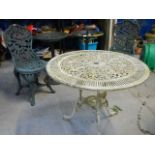 An aluminium garden table, 2 plastic bird baths and 2 plastic chairs.